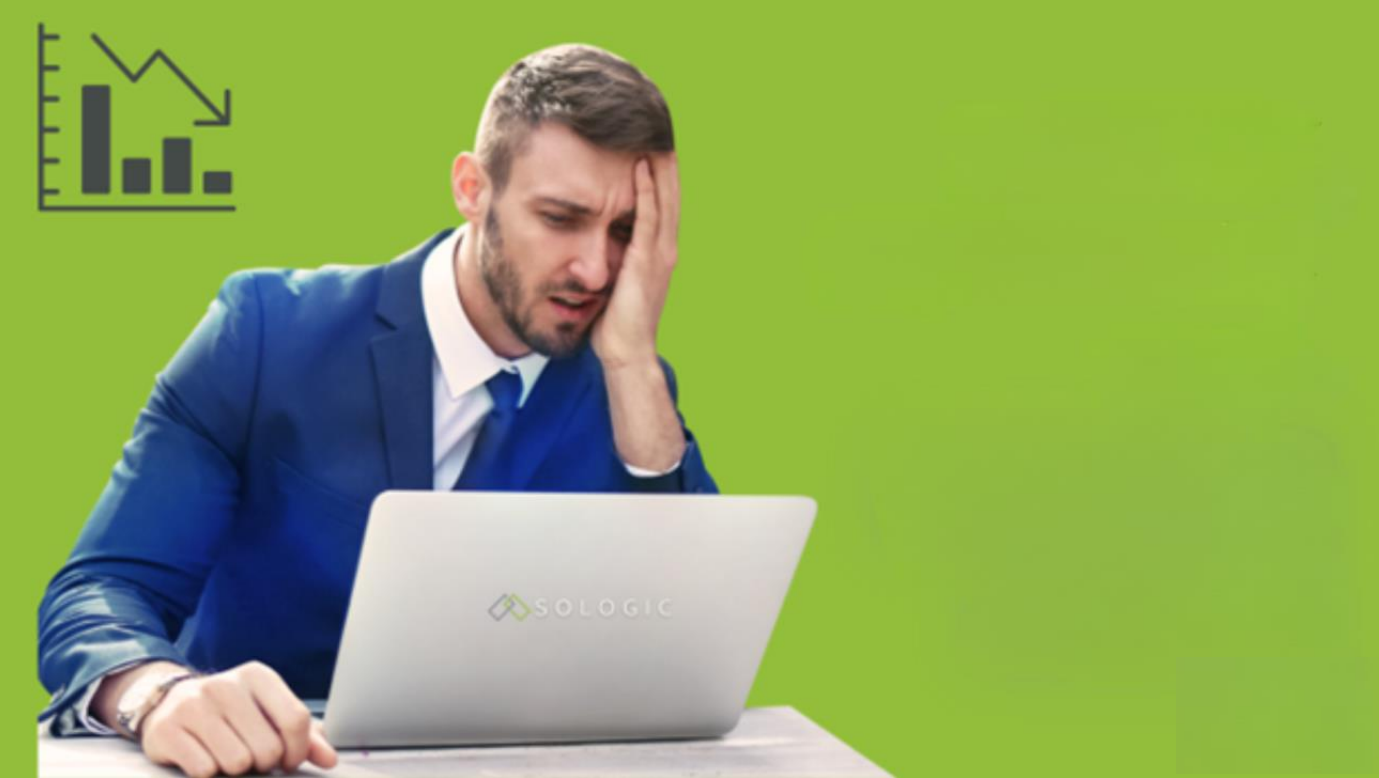 man in blue business suit working on his laptop